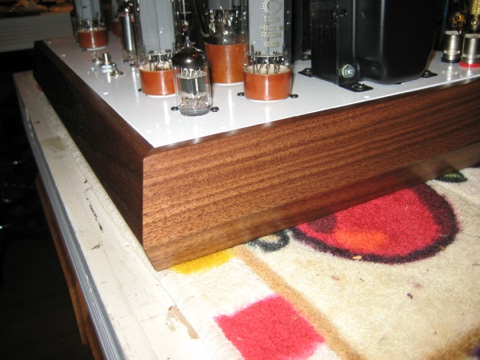 Shown with contemporary solid walnut base